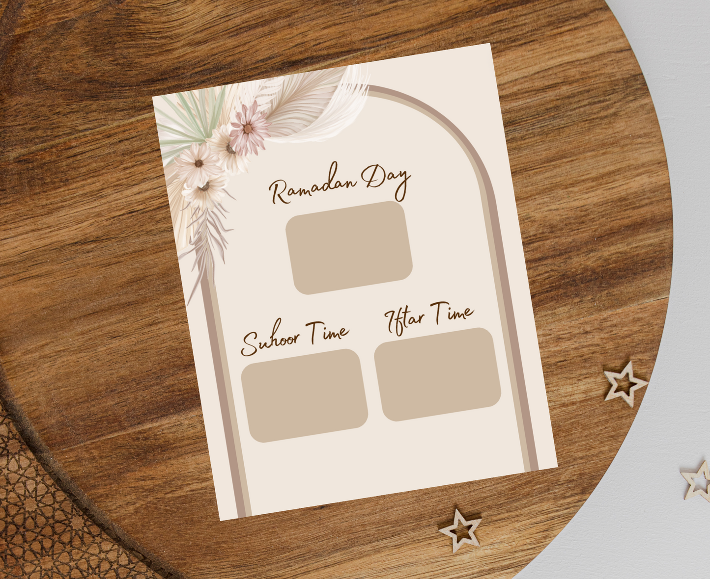 Ramadan Calendar Tracker print displayed on a wooden background. It has Ramadan Day, Suhoor Time, and Iftar Time.