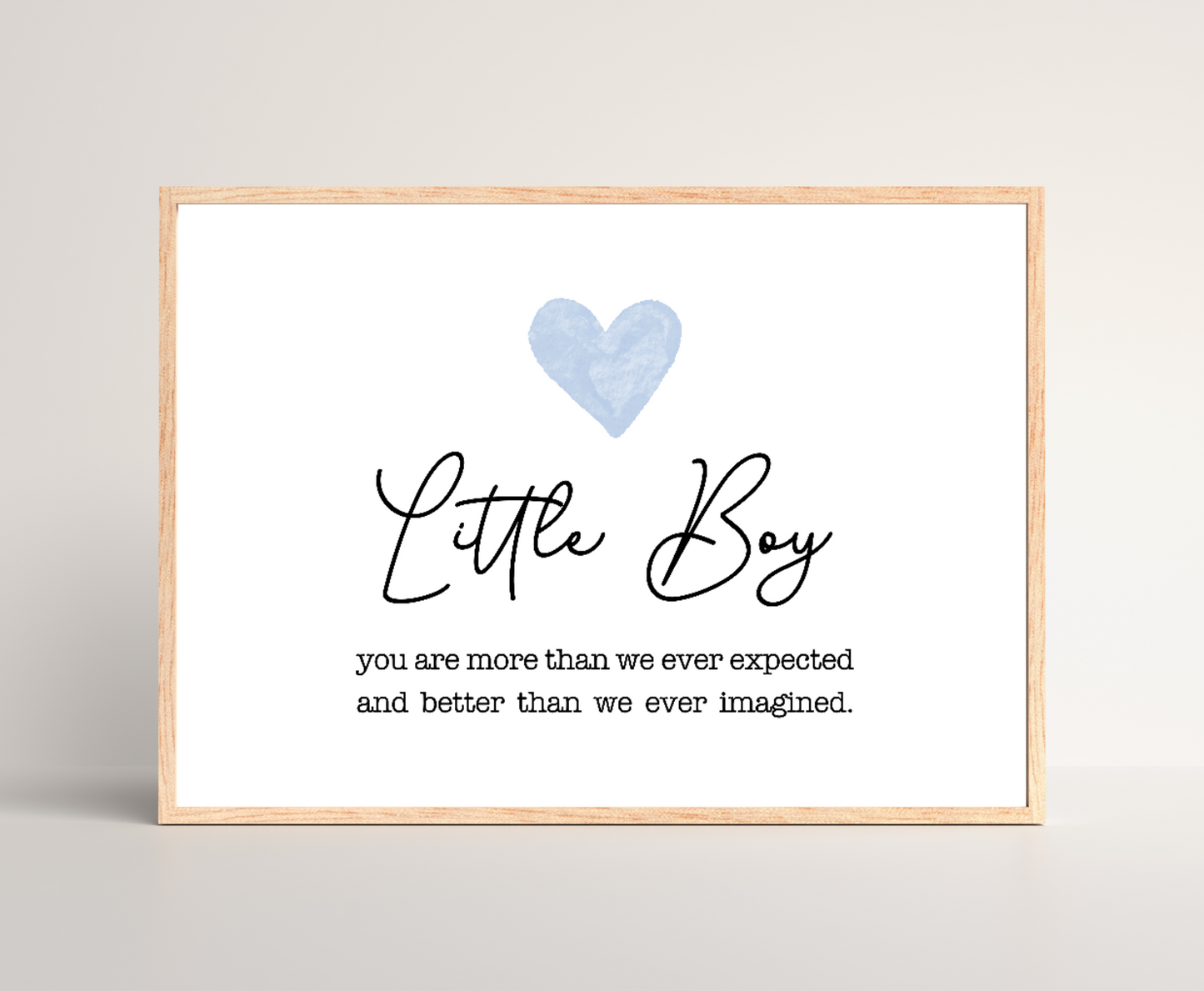 A digital poster showing a blue heart on top with a piece of writing below saying: Little boy, you are more than we ever expected, and better we ever imagined.