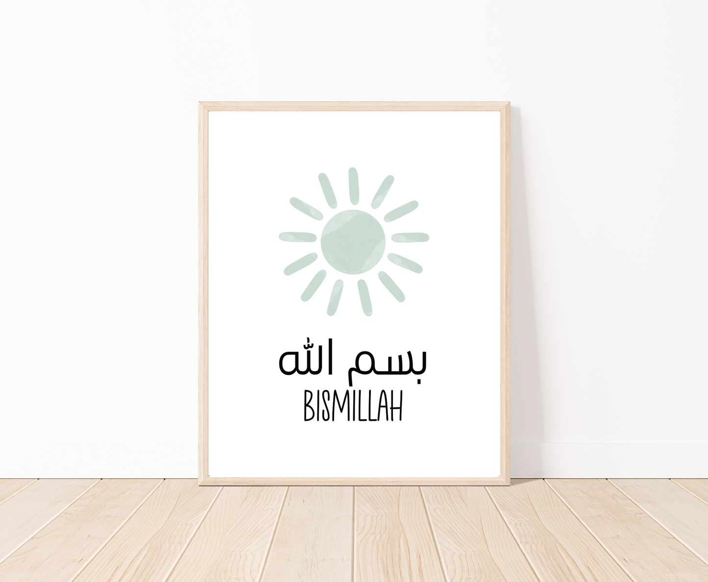A digital poster that is placed on a white wall and parquet flooring shows a baby green sun with “Bismillah” in both Arabic and English written just below it.