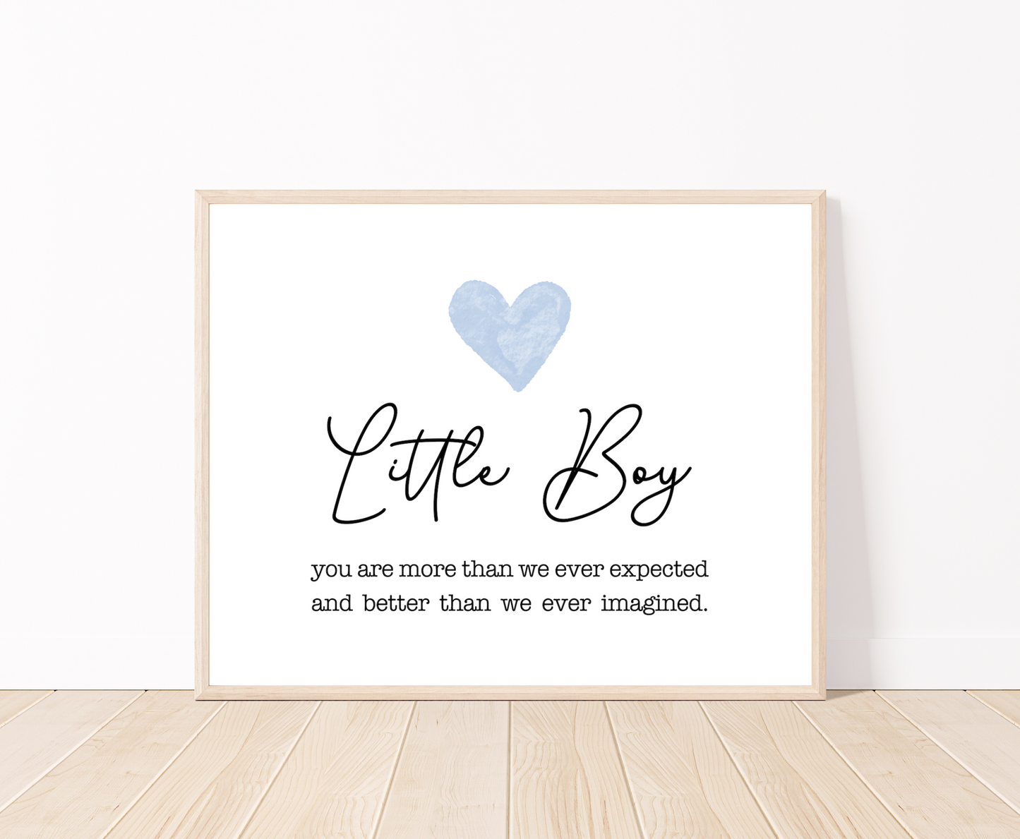 A graphic showing a baby blue heart, with a piece of writing that says, “Little boy, you are more than we ever expected, and better than we ever imagined.”