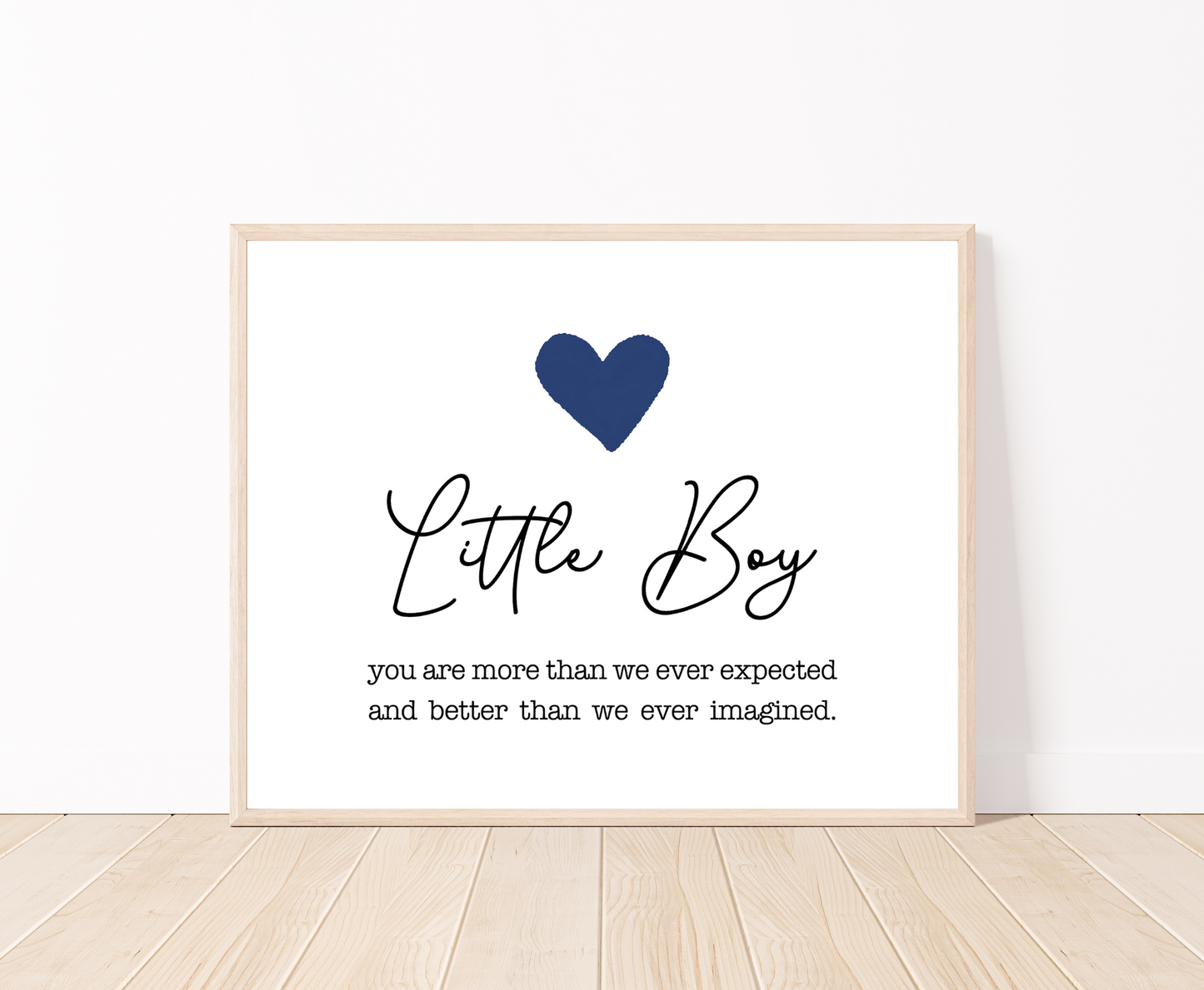 A digital poster showing a navy blue heart on top with a piece of writing below saying: Little boy, you are more than we ever expected, and better we ever imagined.