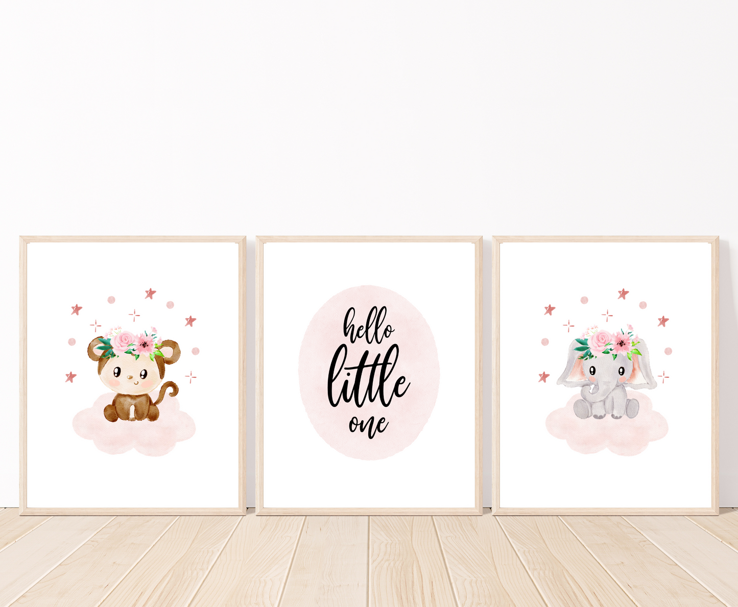 A picture of three graphics. The first one shows a graphic of a pink and brown baby monkey sitting on a baby pink cloud with mini pink stars surrounding its cute head. The middle one has a piece of writing inside a pink oval shape that says” hello little one”. The last one shows a cute baby elephant sitting on a baby pink cloud with mini pink stars surrounding its head.