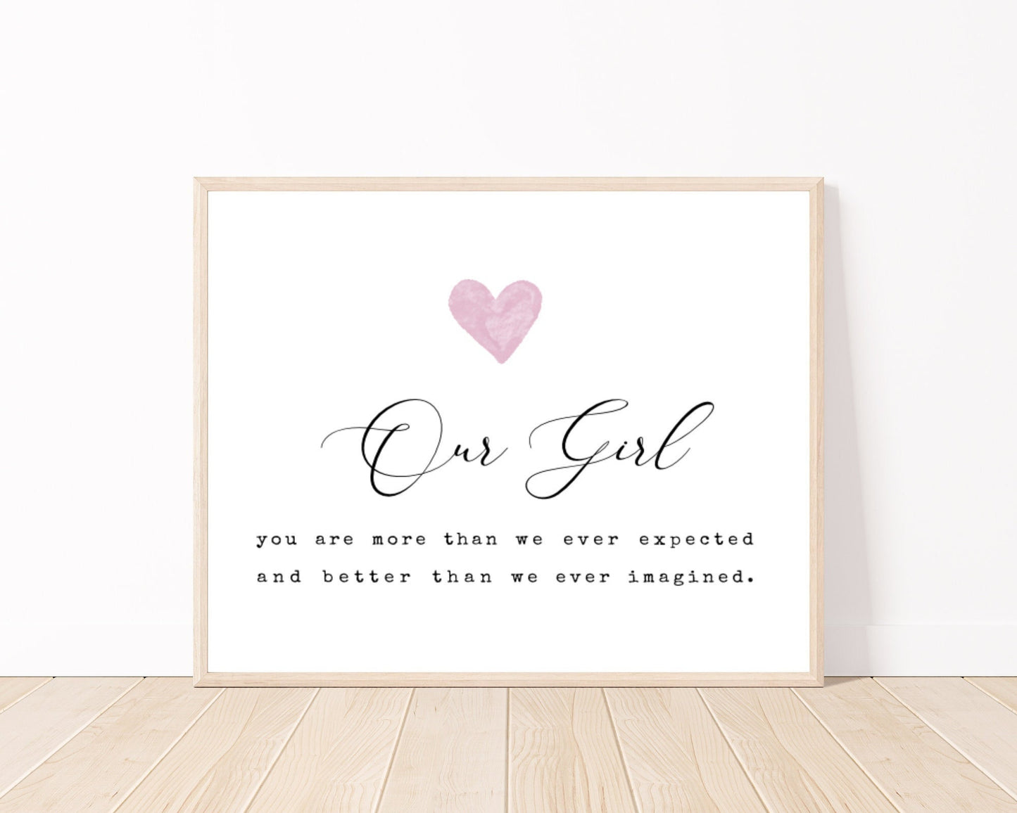 A little girl’s graphic showing a pink heart with a piece of writing below that says: Our girl, you are more than we ever expected, and better than we ever imagined.