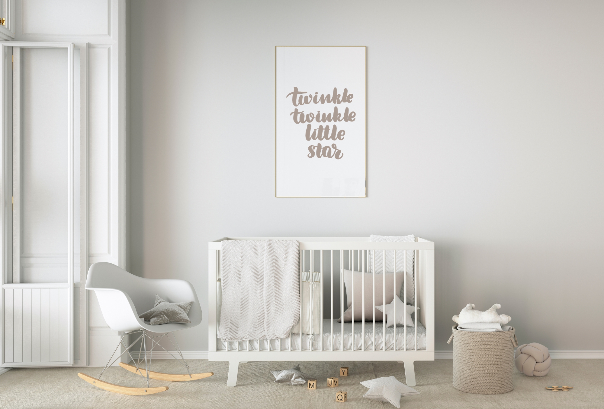 Image of nursery with crib, chair, and wall frame that reads "Twinkle twinkle little star."