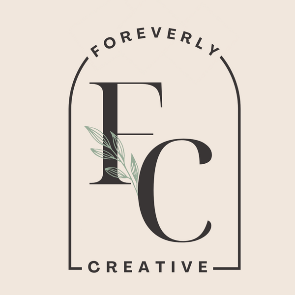 Foreverly Creative logo. A black outline that has the word Foreverly on top and Creative at the bottom. The initials are in the center of the emblem in a bold black text with leaves outlines coming from letter C. All of the above are displayed against a baby pink background.