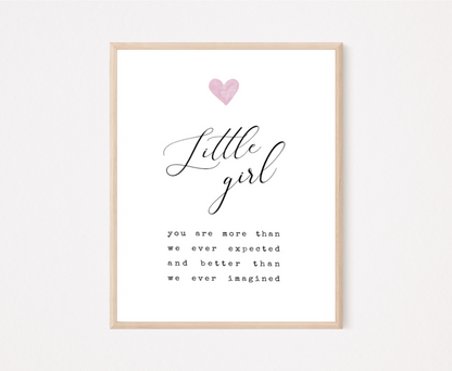 A digital graphic that has pink heart and a piece of writing below that says: little girl you are more than we ever expected and better than we ever imagined. 