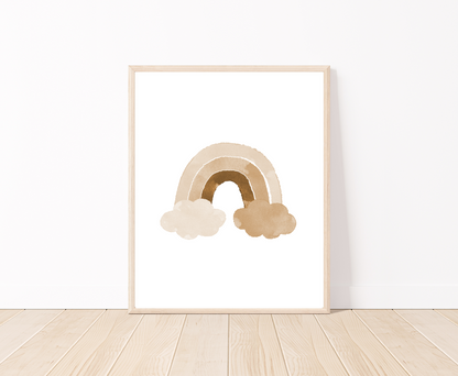 Baby’s digital poster showing a rainbow in different shades of beige behind two clouds. The frame is placed on a parquet floor.