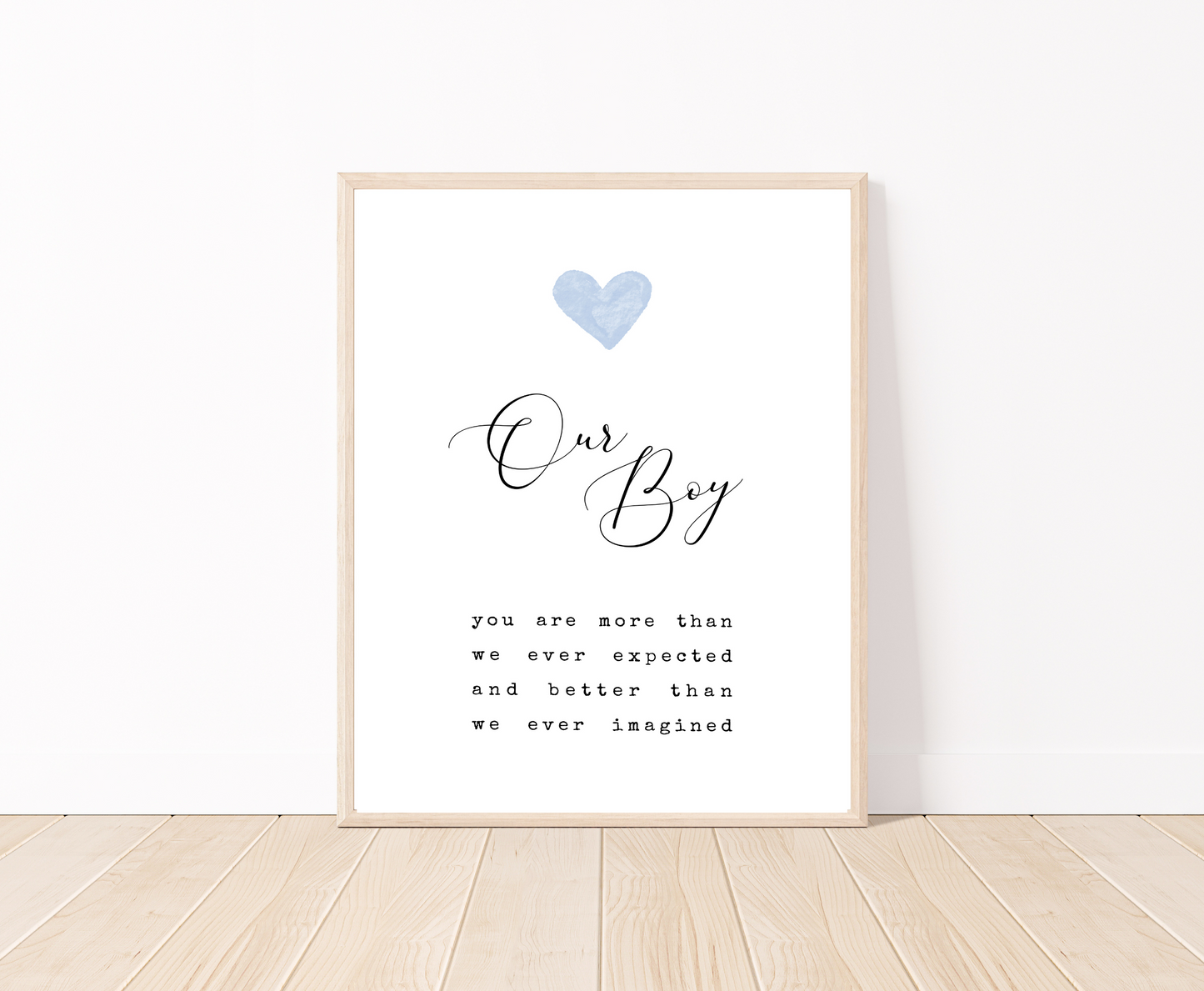 A frame showing a digital poster for a little boy’s room. It has a blue heart on top, with the words “Our Boy” written below, and a piece of writing that says: You are more than we ever expected, and better than we ever imagined.