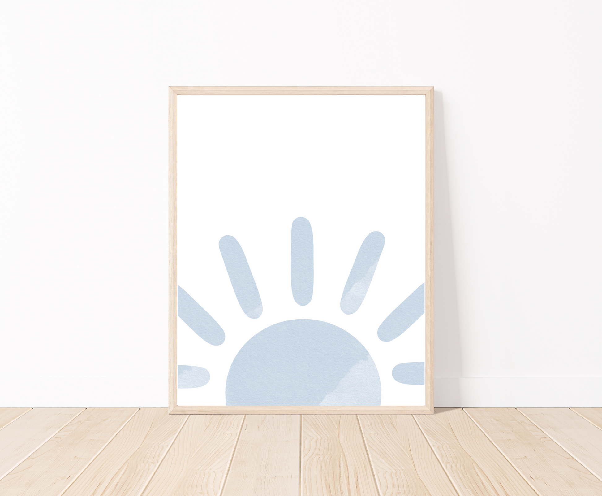 A digital poster is placed on a white wall and parquet flooring and shows a baby blue sun at the base of the frame.