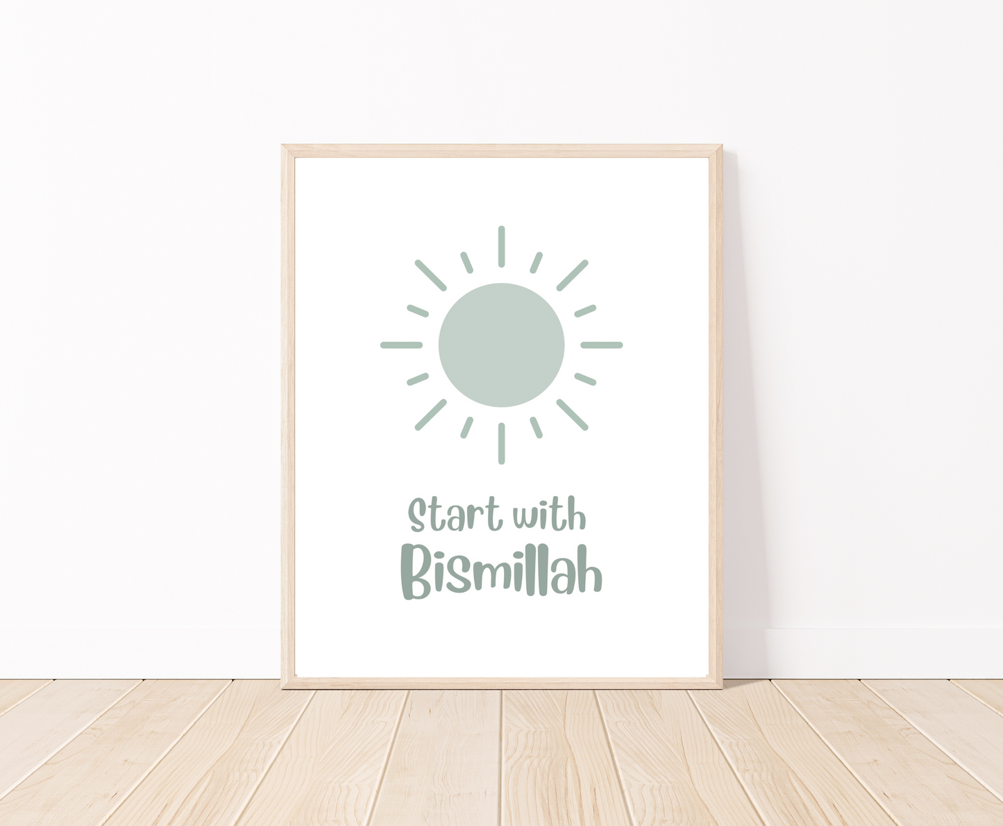 A digital poster that is placed on a white wall and parquet flooring shows a baby green sun with “Start with Bismillah” written right below.