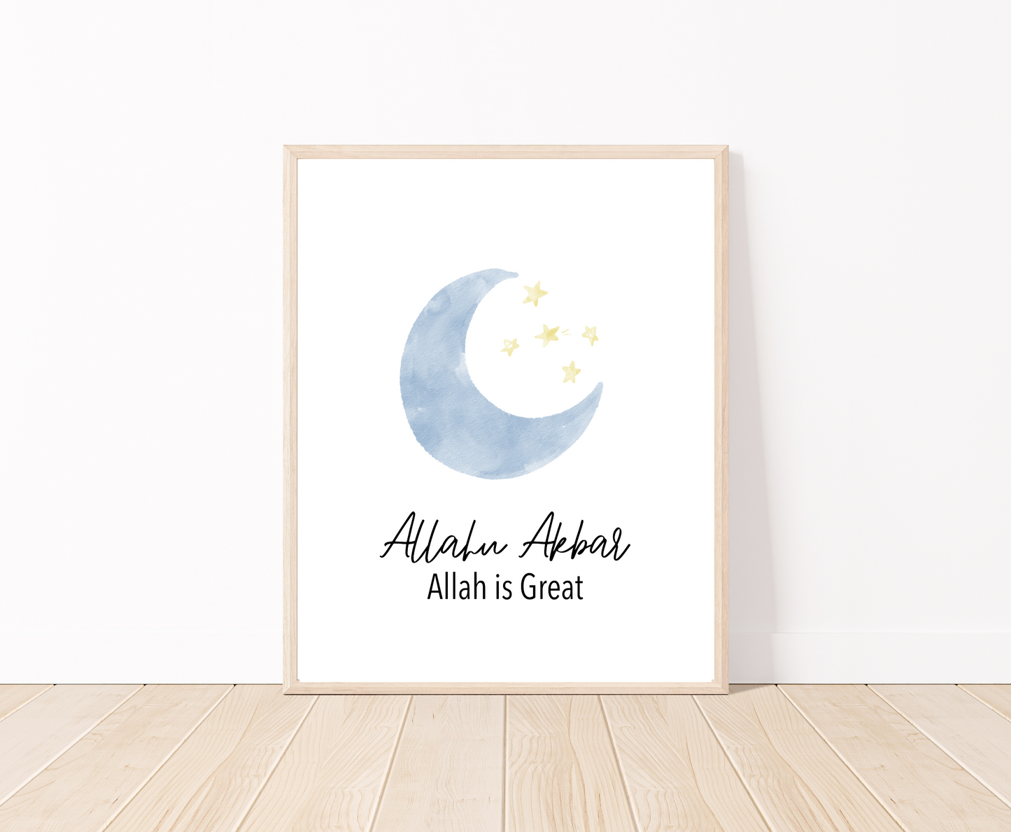 A little boy’s room digital poster that is placed on a white wall and parquet flooring shows a baby blue crescent and tiny yellow stars with the word “Allahu Akbar”, Allah is great, written below.