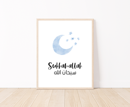 A digital print placed on a white wall and parquet flooring showing a small blue moon and three small stars with a piece of writing below that says: “Subhanallah”.
