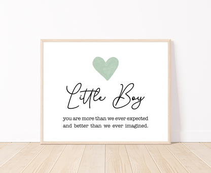 A graphic showing baby green heart, with a piece of writing that says, “Little boy, you are more than we ever expected, and better than we ever imagined.”