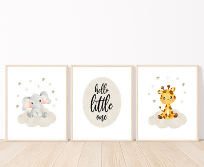 A picture of three graphics. The first one shows a graphic of a grey baby elephant sitting on a grey cloud with mini stars surrounding its cute head. The middle one has a piece of writing inside a grey oval shape that says” hello little one”. The last one shows a cute baby giraffe sitting on a grey cloud with mini stars surrounding its head. 