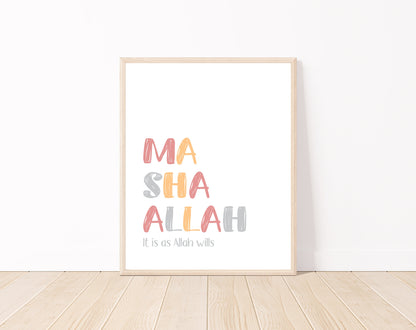 A digital print is placed on a white wall and parquet flooring. It includes “Mashallah, it is as Allah wills” written in multi-colored letters with a white background.