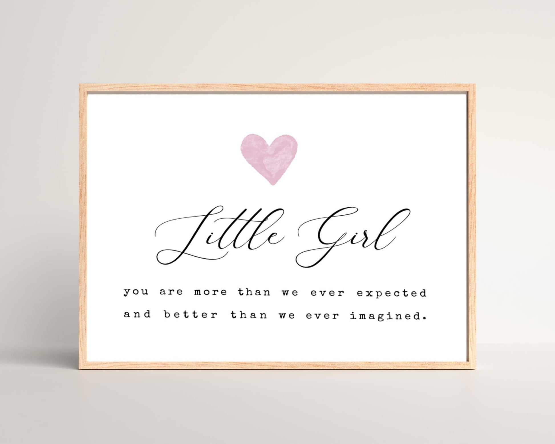 A little girl’s room horizontal digital print that has a pink heart at the top, and a piece of writing that says: “Little girl, you are more than we ever expected and better than we ever imagined.”