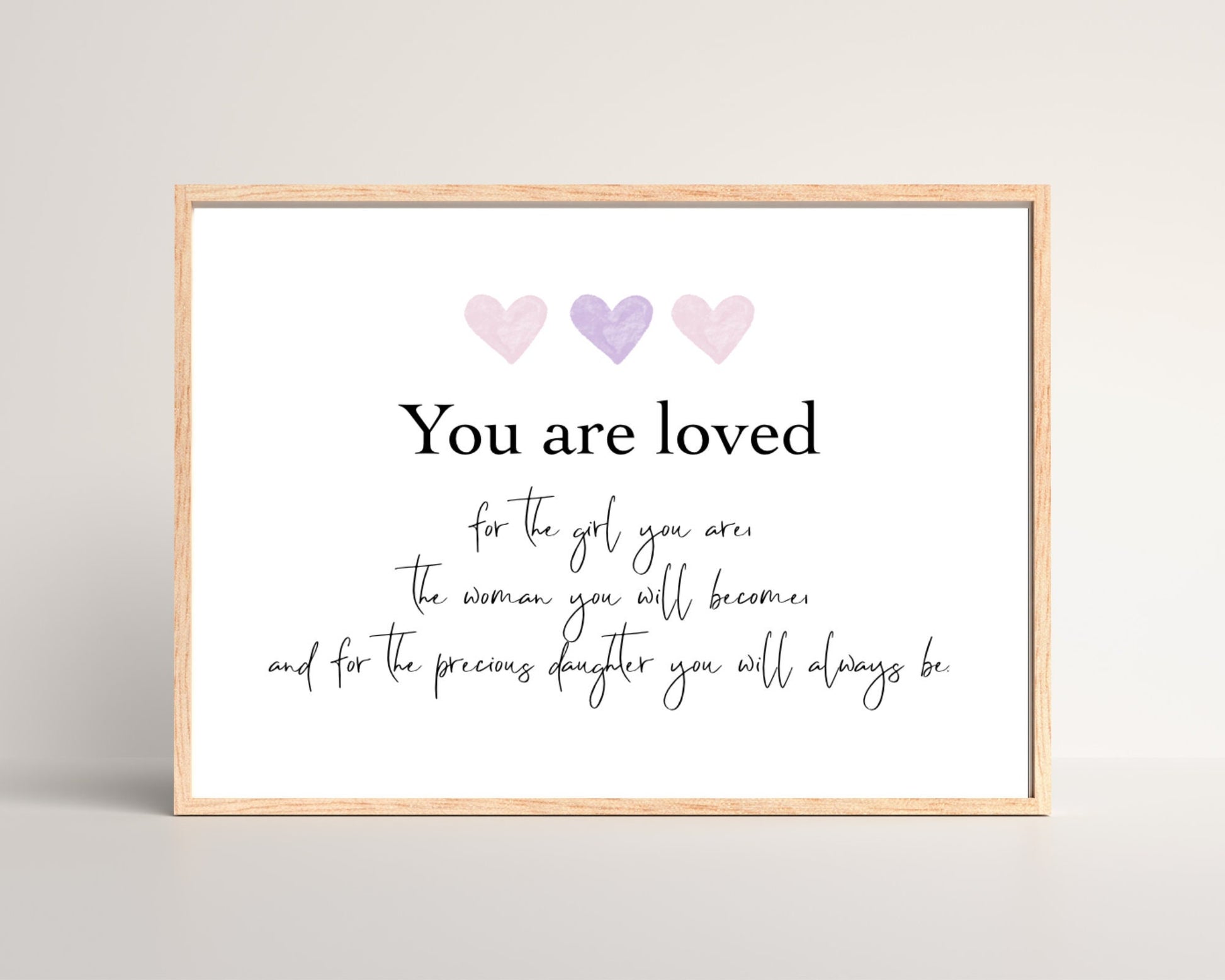 A little girl’s room digital poster that has three hearts at the top with a piece of writing that says: “You are loved for the girl you are, the woman you will become, and for the precious daughter you will always be.”