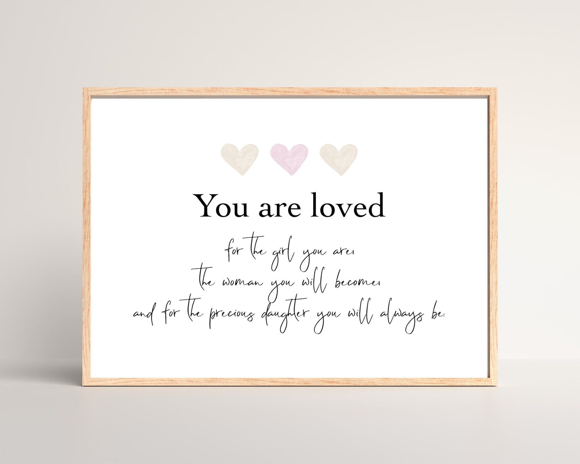 A little girl’s room digital poster that has three hearts at the top with a piece of writing that says: “You are loved for the girl you are, the woman you will become, and for the precious daughter you will always be.”