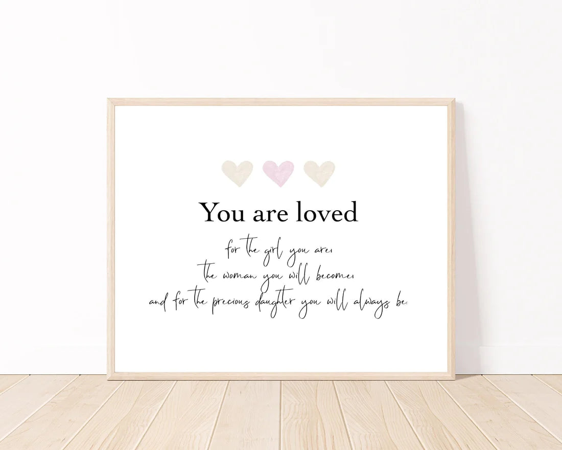 A digital poster that has three tiny baby pink and beige hearts, and a piece of writing below that says: You are loved, for the girl you are, the woman you will become, and for the precious daughter you will always be.