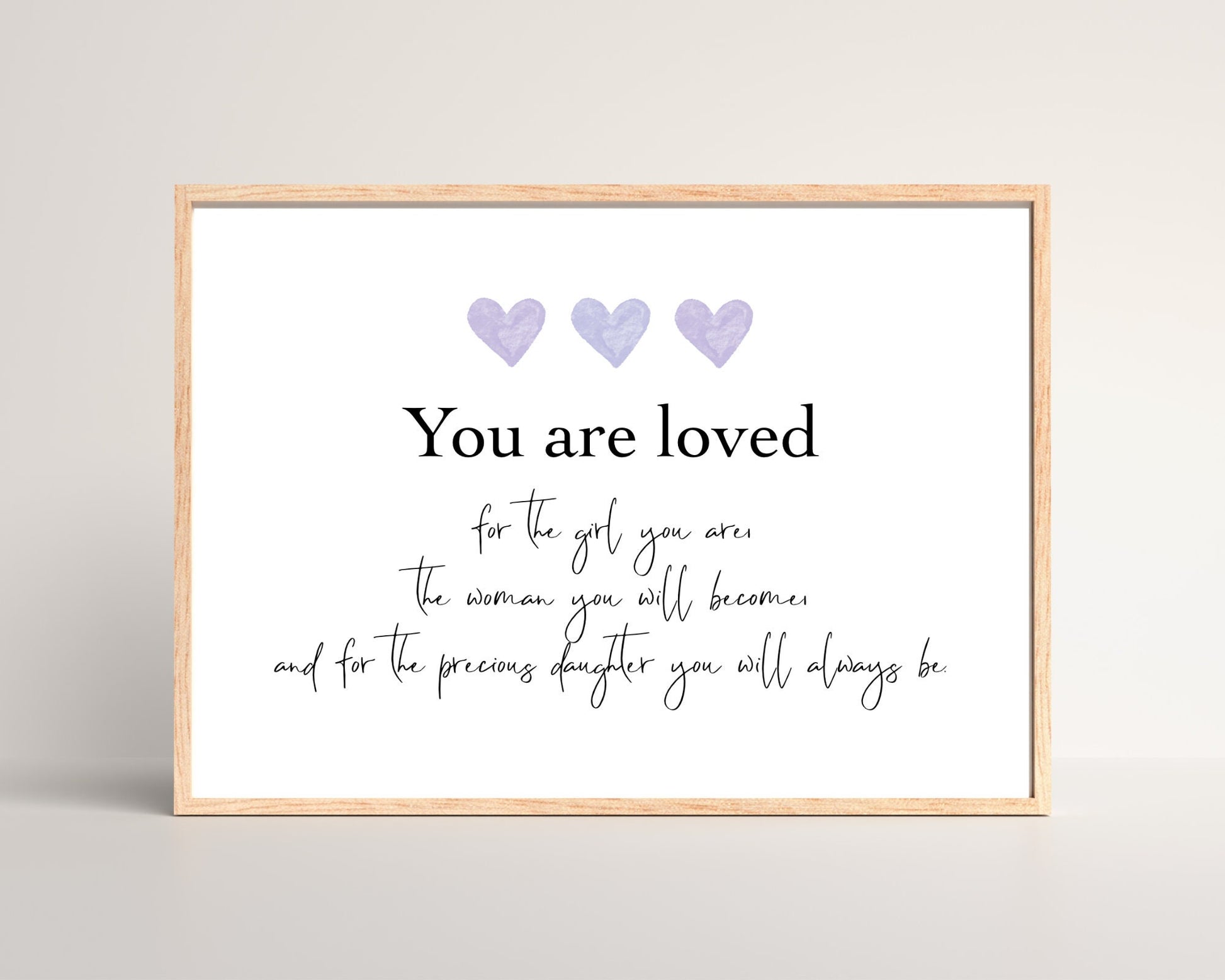 A little girl’s room digital poster that has three purple hearts at the top with a piece of writing that says: “You are loved for the girl you are, the woman you will become, and for the precious daughter you will always be.”