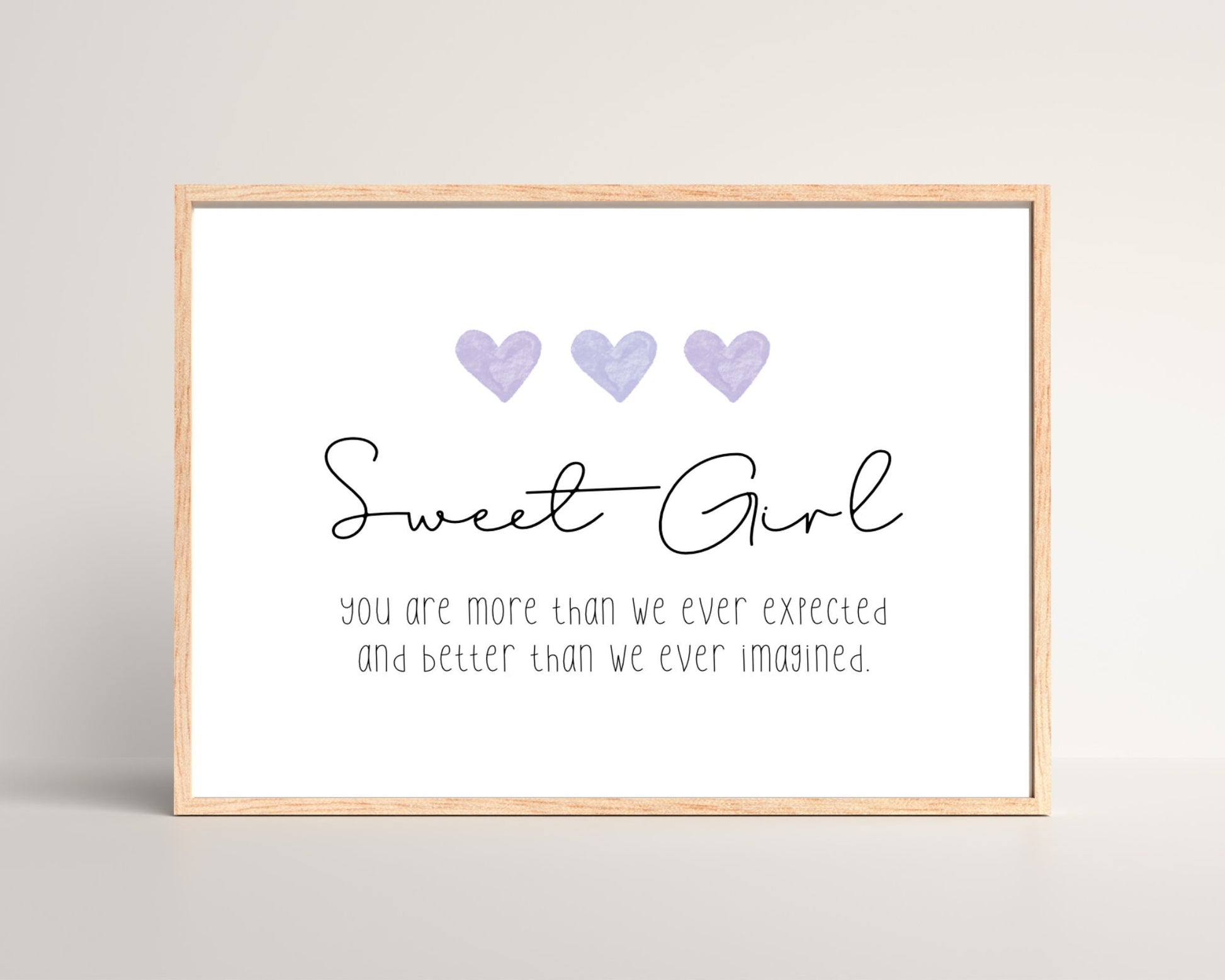 A little girl’s room digital print that has three purple hearts at the top, and a piece of writing that says: “Sweet girl, you are more than we ever expected and better than we ever imagined.”